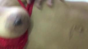 hot brunette films her tits and fingers her pussy in her room