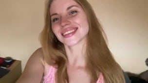 Pretty girl shows off her pink nightie.